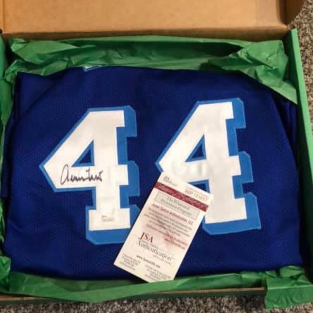 Jerry West signed and authenticated jersey